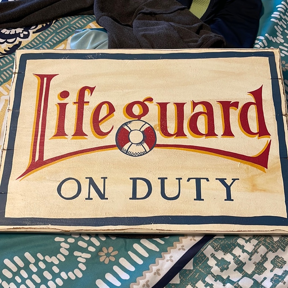 Lifeguard on duty sign